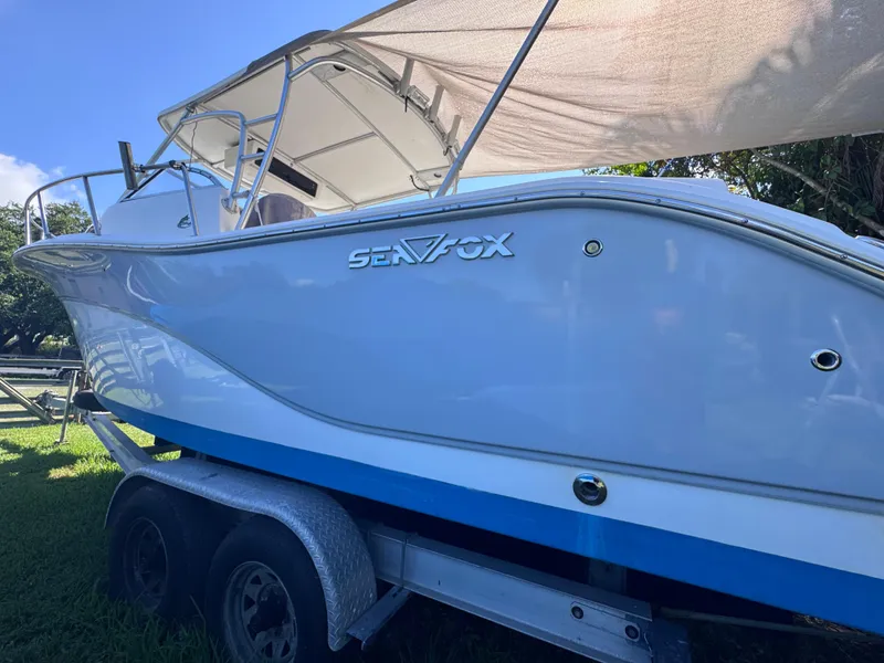 Slide: The Image of 2011 Sea Fox 256 WA Voyager boat on trailer, side view. - 21