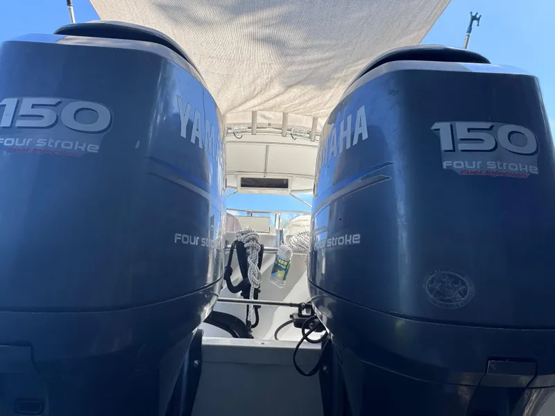 Slide: The Image of Twin Yamaha 150 four-stroke engines on a 2011 Sea Fox 256 WA Voyager boat. - 29