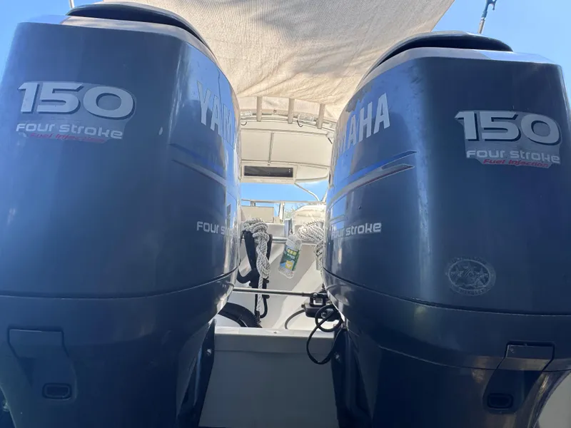 Slide: The Image of Twin Yamaha 150 four-stroke engines on a 2011 Sea Fox 256 WA Voyager boat. - 30