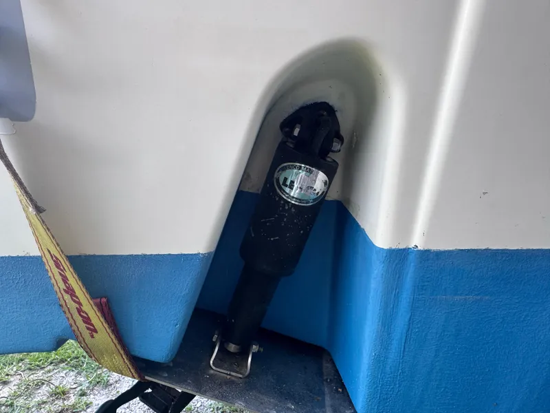 Slide: The Image of 2011 Sea Fox 256 WA Voyager boat detail with blue and white hull. - 31