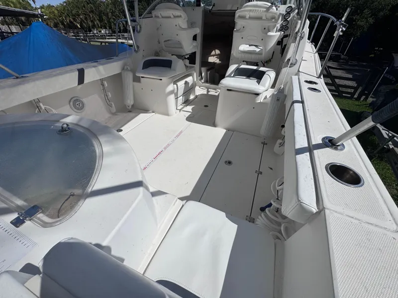 Slide: The Image of 2011 Sea Fox 256 WA Voyager boat interior with seating and helm. - 35