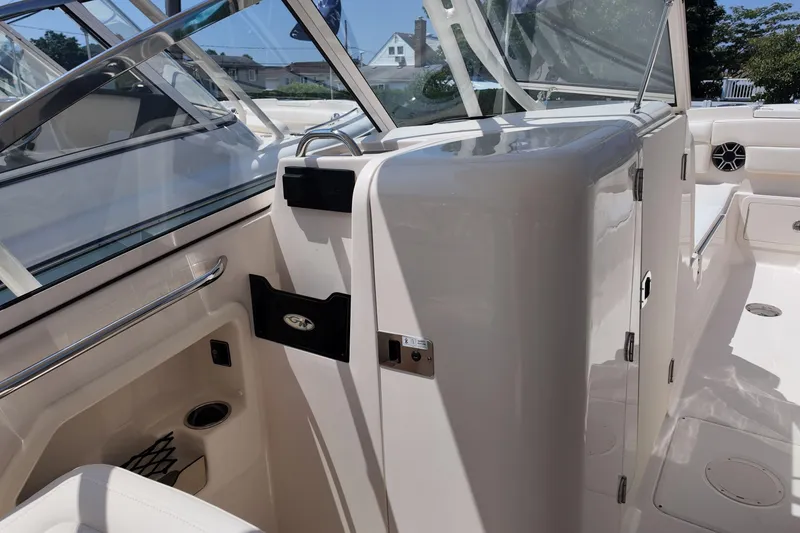Slide: The Image of 2026 Grady-White Freedom 275 boat interior, featuring sleek design and modern amenities. - 19
