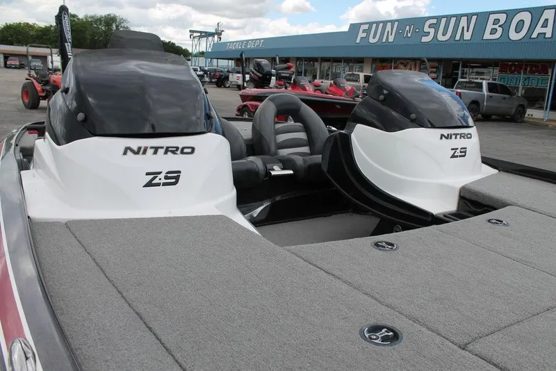 Slide: The Image of 2012 Nitro Z-9 boat at Fun-N-Sun Boats dealership, showcasing dual engines. - 10