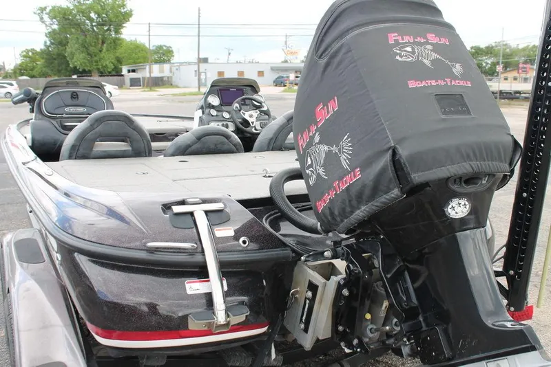 Slide: The Image of 2012 Nitro Z-9 boat with covered engine, parked outdoors. - 4
