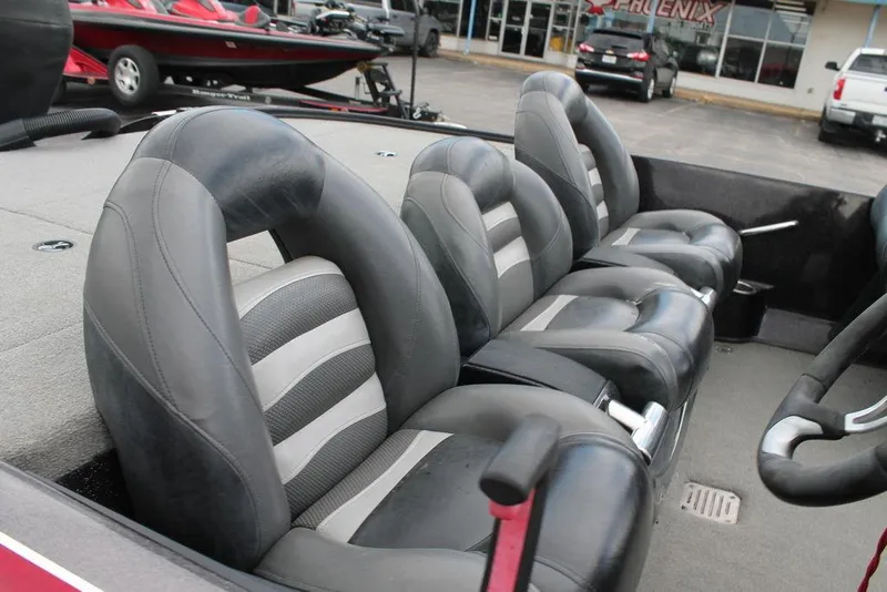 Slide: The Image of 2012 Nitro Z-9 boat interior with four gray and black seats. - 9