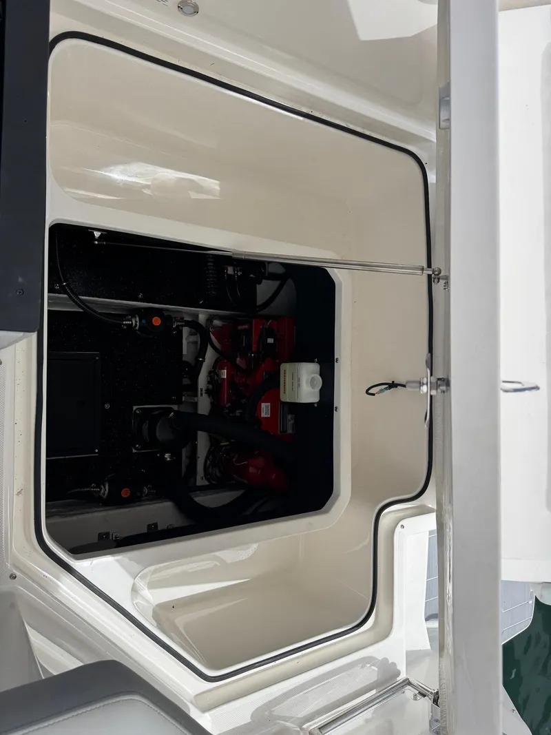 Slide: The Image of 2025 Regal 26 XO boat engine compartment, showcasing modern design and engineering. - 17