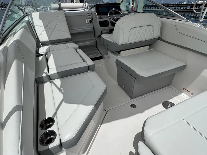 Slide: The Image of 2025 Regal 26 XO boat interior with luxurious seating and modern design. - 18
