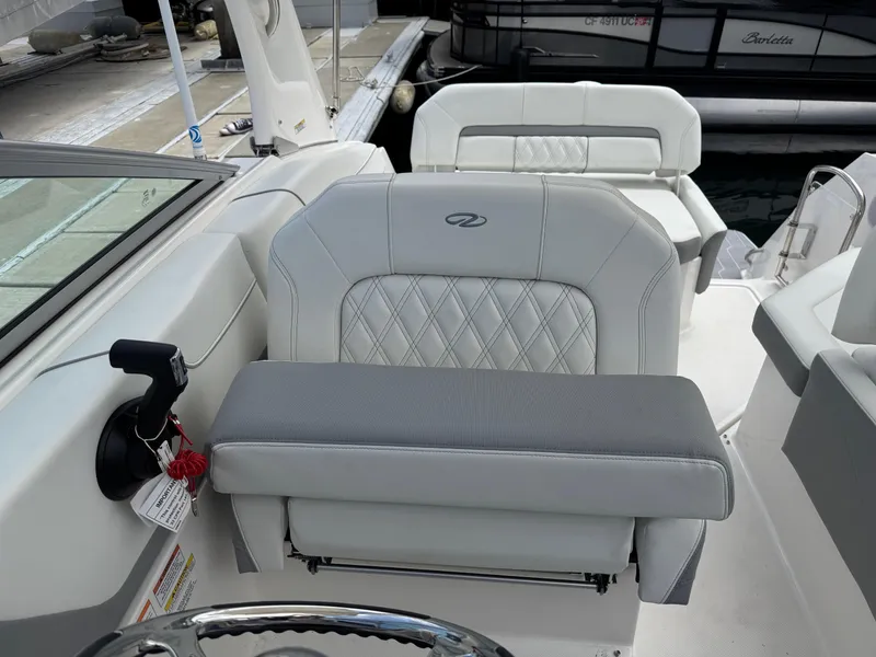 Slide: The Image of 2025 Regal 26 XO boat interior with luxurious seating and modern design. - 26