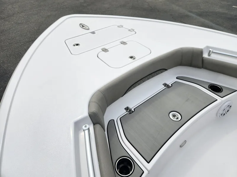 Slide: The Image of 2025 Sportsman Masters 247OE Bay Boat bow with seating and storage compartments. - 11