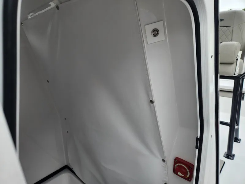 Slide: The Image of 2025 Sportsman Masters 247OE Bay Boat interior storage compartment. - 20