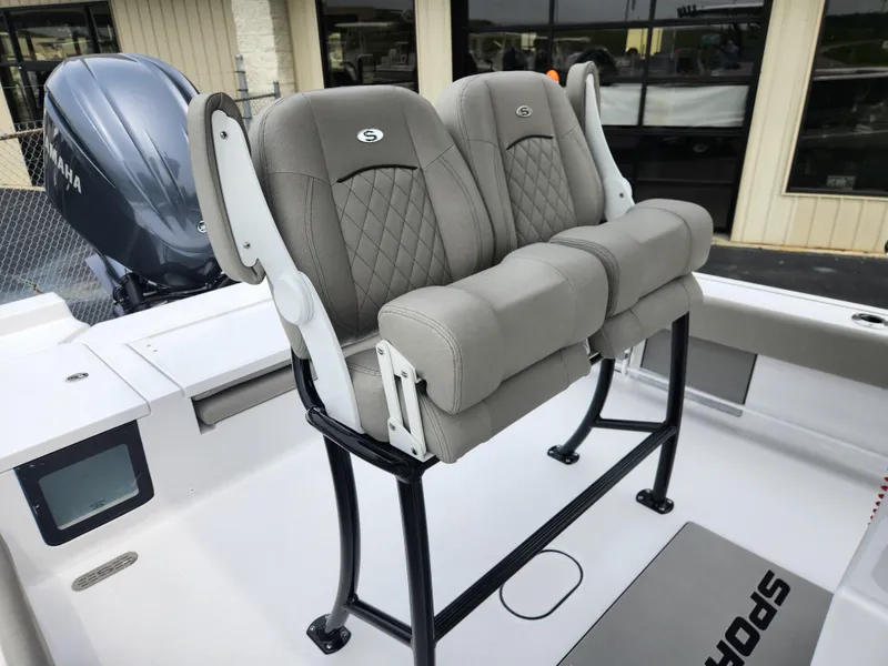 Slide: The Image of 2025 Sportsman Masters 247OE Bay Boat with dual cushioned seats and Yamaha engine. - 22