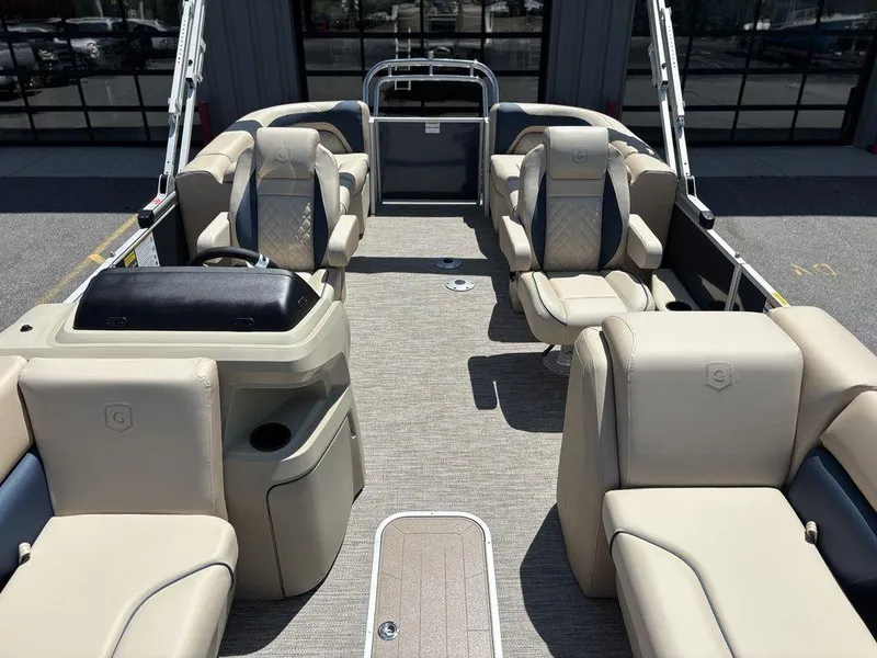 Slide: The Image of 2025 Godfrey SWEETWATER 2286 SB pontoon boat with beige seating and modern interior design. - 13