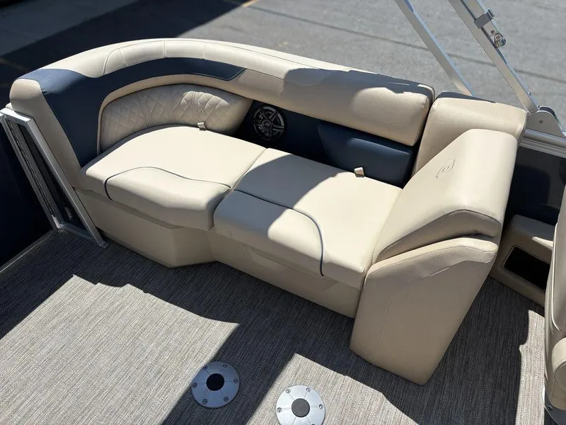 Slide: The Image of Luxurious seating on 2025 Godfrey SWEETWATER 2286 SB pontoon boat, featuring beige upholstery. - 4