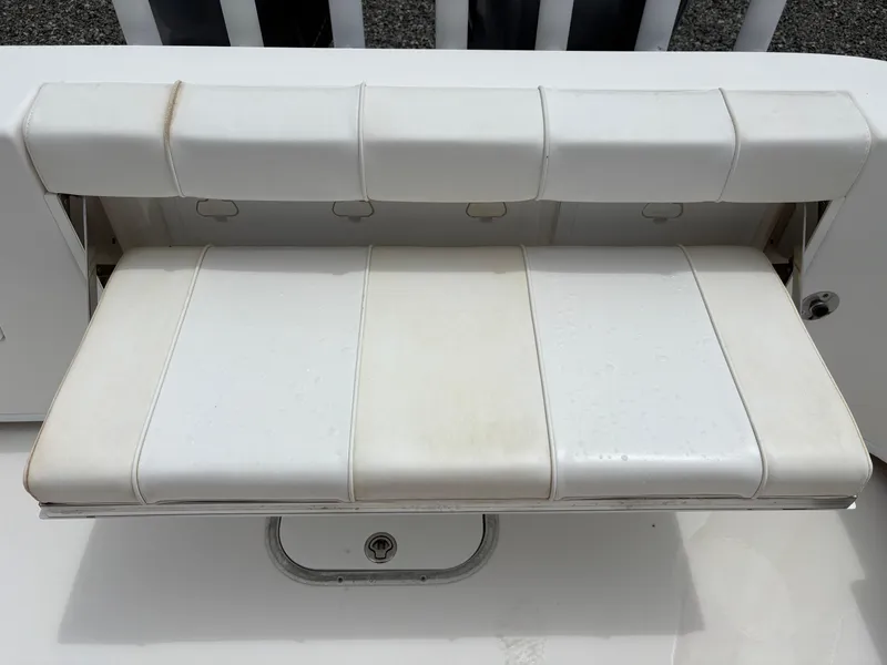 Slide: The Image of White cushioned seat on 2015 Cape Horn 27X3 boat, showing slight wear. - 11