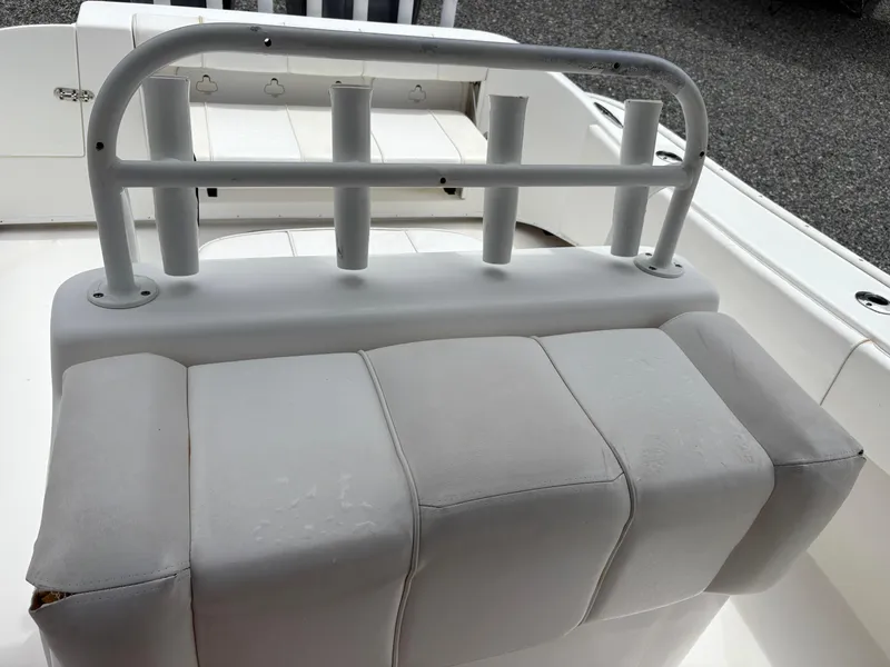 Slide: The Image of 2015 Cape Horn 27X3 boat seating with rod holders, white upholstery. - 15