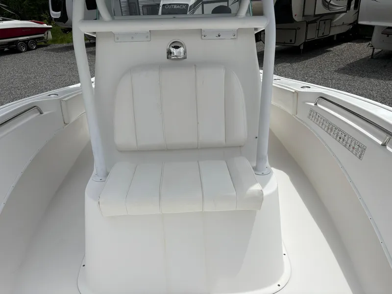 Slide: The Image of 2015 Cape Horn 27X3 boat interior with white seating and console. - 18