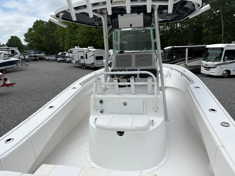 Slide: The Image of 2015 Cape Horn 27X3 boat with center console, parked in a lot with RVs. - 29