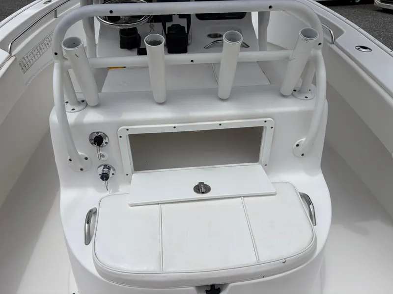Slide: The Image of 2015 Cape Horn 27X3 boat console with rod holders and storage compartment. - 9