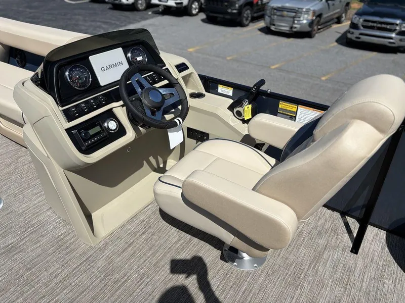 Slide: The Image of 2025 Godfrey Sweetwater 2486 SFLC boat helm with Garmin navigation system. - 9