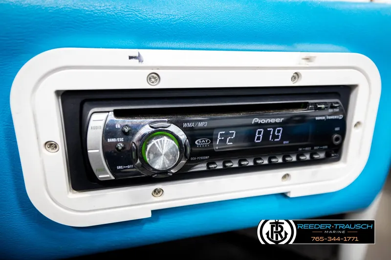 Slide: The Image of Pioneer car stereo in 1993 Excel 20SX, displaying FM frequency 87.9. - 32