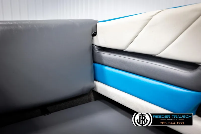 Slide: The Image of Gray and blue boat interior upholstery of a 1993 Excel 20SX. - 34