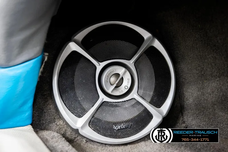 Slide: The Image of Speaker installed in a 1993 Excel 20SX boat, featuring a sleek design. - 35