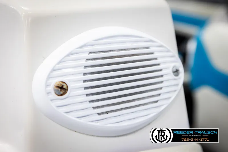 Slide: The Image of White speaker grill on 1993 Excel 20SX boat, close-up view. - 36
