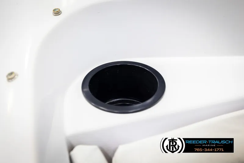 Slide: The Image of Cup holder on 1993 Excel 20SX boat, white interior detail. - 38