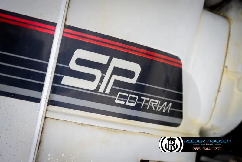 Slide: The Image of Close-up of 1993 Excel 20SX SP CD-Trim logo with red and black stripes. - 42