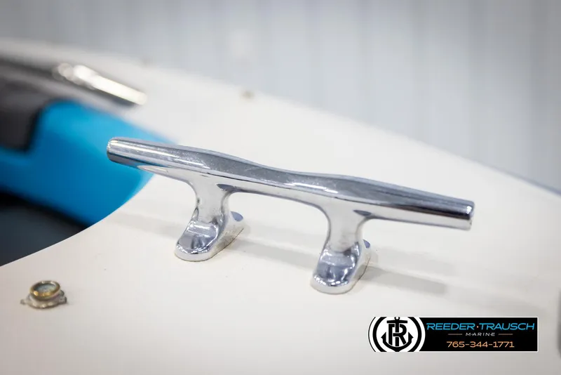 Slide: The Image of Chrome boat cleat on 1993 Excel 20SX, Reeder-Trausch Marine branding visible. - 47