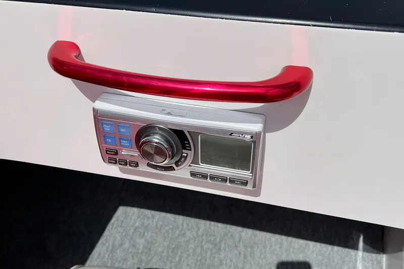 Slide: The Image of Control panel with red handle on 2004 Spectre 36 Cat boat dashboard. - 16
