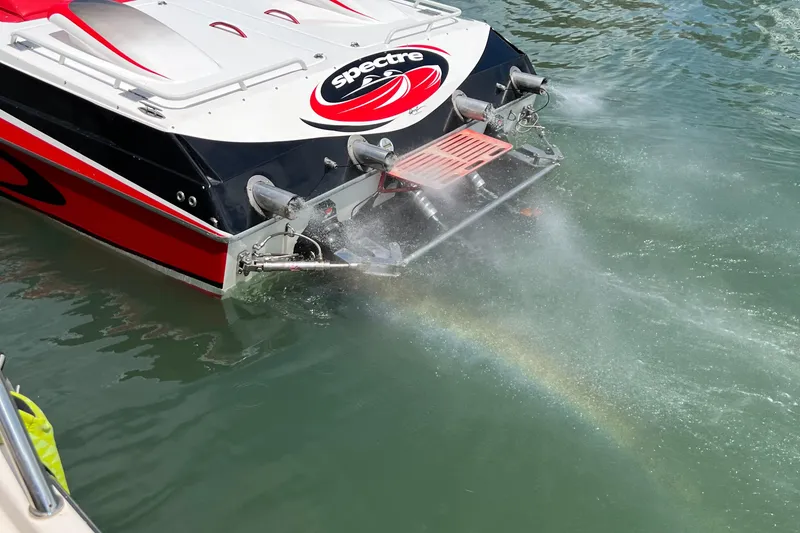 Slide: The Image of 2004 Spectre 36 Cat boat with water spray and rainbow effect. - 3