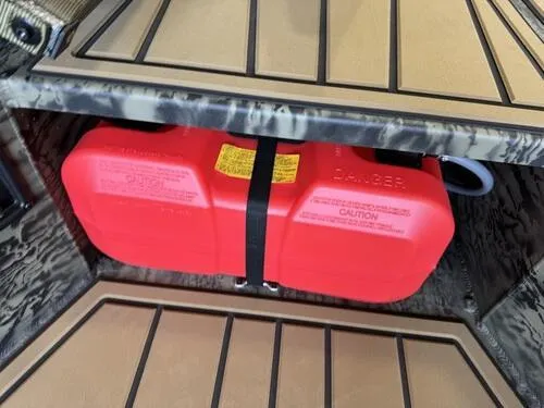 Slide: The Image of Red fuel tank secured in 2025 Tracker Grizzly 1650 T Prairie Wings Edition boat. - 12