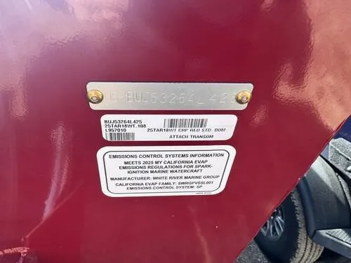 Slide: The Image of 2025 Tracker Targa V-18 WT boat identification and emissions control information plate. - 13