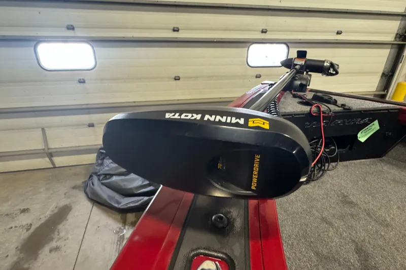 Slide: The Image of 2025 Tracker Targa V-18 WT with Minn Kota PowerDrive trolling motor in garage. - 16
