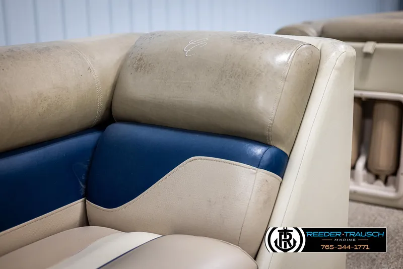 Slide: The Image of Cypress Cay 250 Cozumel 2012 boat seating with beige and blue upholstery. - 38