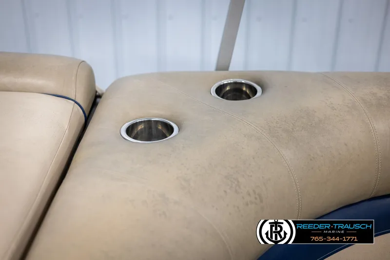 Slide: The Image of Cypress Cay 250 Cozumel 2012 boat seating with built-in cup holders. - 41