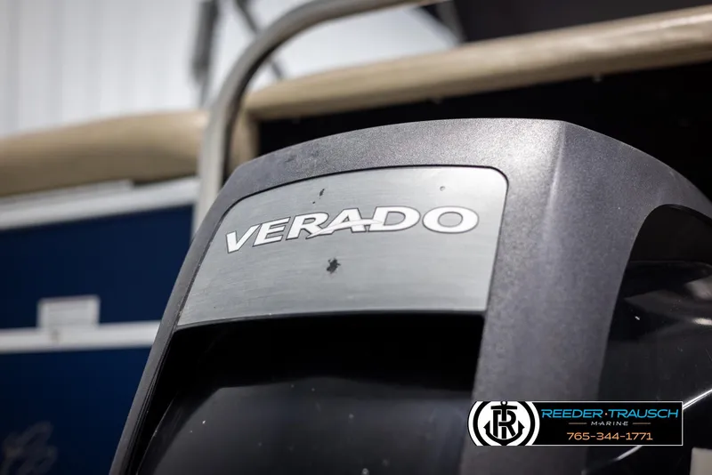 Slide: The Image of Outboard motor on a 2012 Cypress Cay 250 Cozumel boat, featuring Verado branding. - 46
