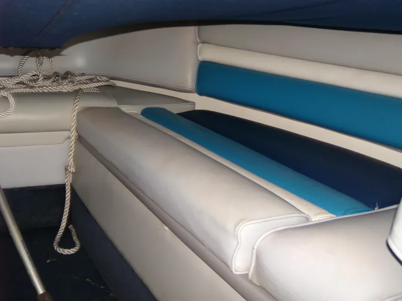 Slide: The Image of Interior of 1989 Chaparral 2300 SX Sport boat with blue and white seating. - 21
