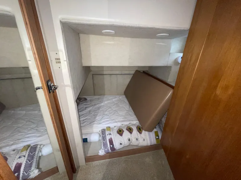 Slide: The Image of 1998 Bayliner 4087 Aft Cabin Motoryacht interior cabin with bed and storage. - 15