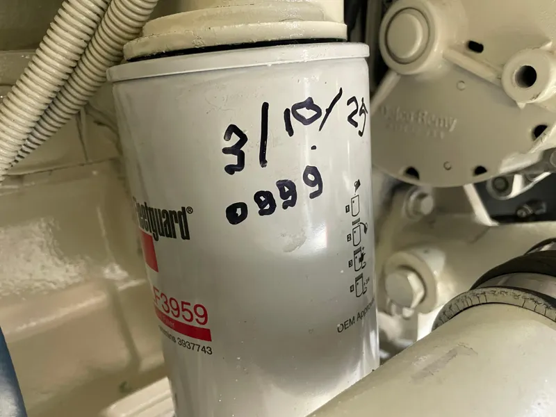 Slide: The Image of Fuel filter with handwritten date on a 1998 Bayliner 4087 Aft Cabin Motoryacht. - 21