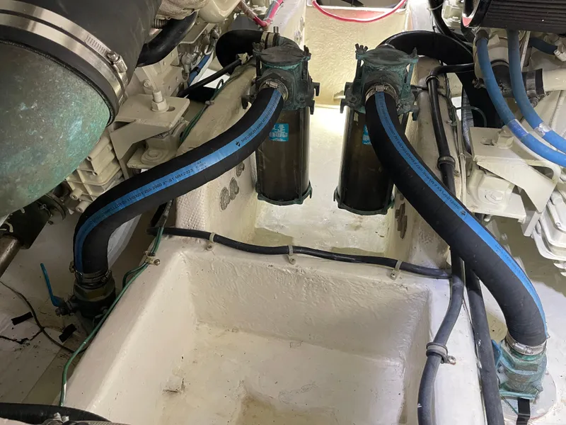 Slide: The Image of Engine room of 1998 Bayliner 4087 Aft Cabin Motoryacht with hoses and filters. - 22