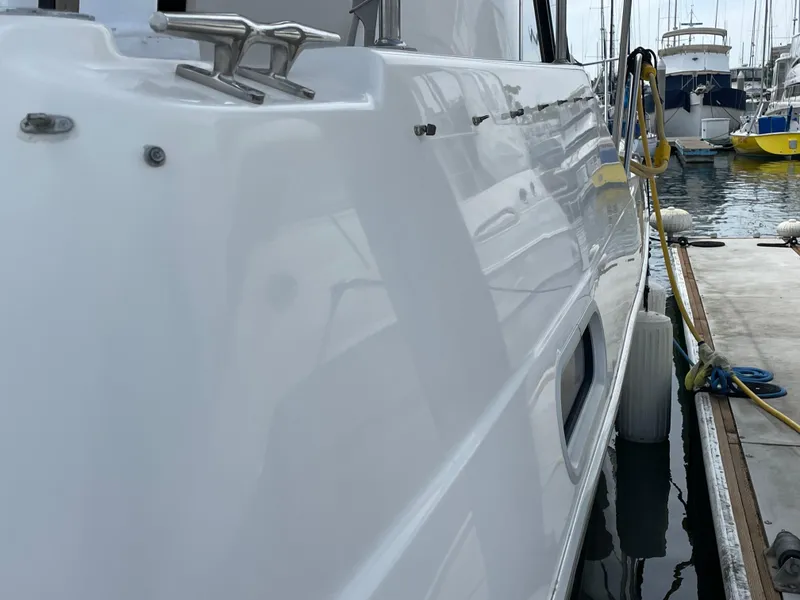 Slide: The Image of 1998 Bayliner 4087 Aft Cabin Motoryacht docked at marina, side view. - 27