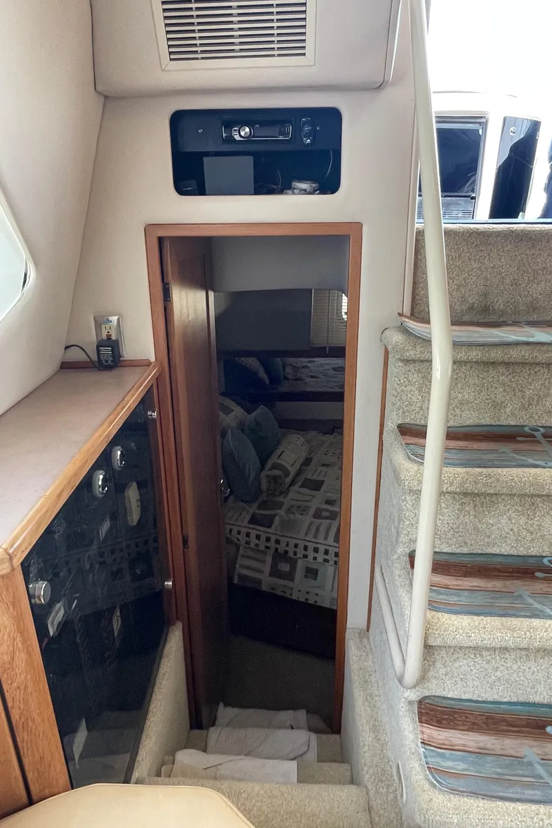 Slide: The Image of 1998 Bayliner 4087 Aft Cabin Motoryacht interior with stairs and cabin view. - 32