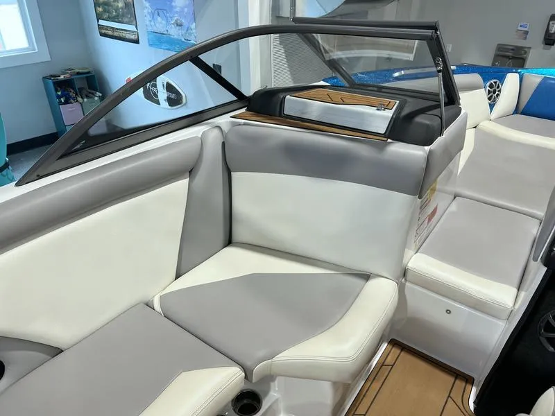 Slide: The Image of 2019 Tigé R23 boat interior with gray and white seating, modern design. - 8