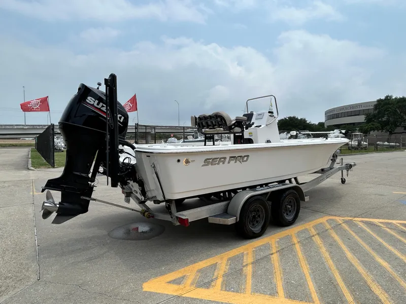 Slide: The Image of 2020 Sea Pro 228 Bay boat on trailer with Suzuki outboard motor. - 3
