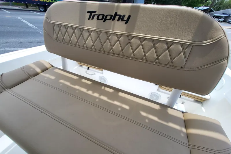 Slide: The Image of 2024 Bayliner Trophy T22CC boat seat with diamond stitching and "Trophy" logo. - 12