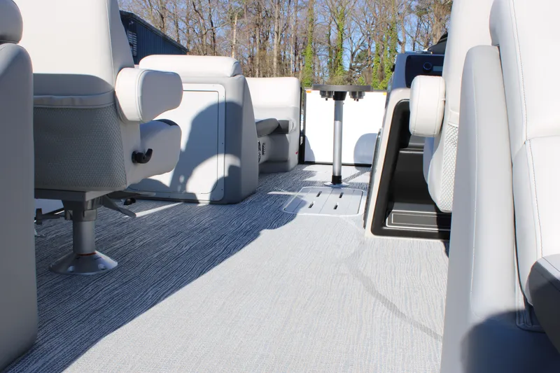 Slide: The Image of 2025 SunCatcher Select 324RC interior with plush seating and modern design. - 16