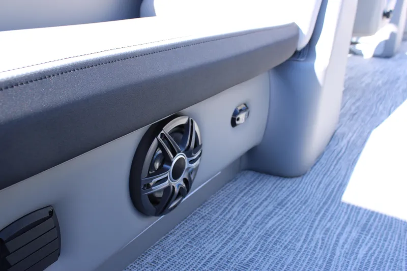 Slide: The Image of 2025 SunCatcher Select 324RC interior with speaker and modern seating design. - 17