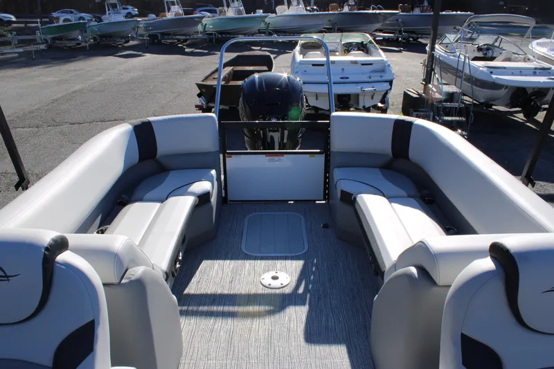 Slide: The Image of 2025 SunCatcher Select 324RC pontoon boat with spacious seating and modern design. - 9
